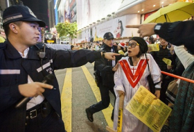Over 100 protesters resisting efforts to clear streets detained in Hong Kong